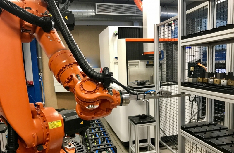 Cèl·lula robotitzada per a la fabricació de motlles